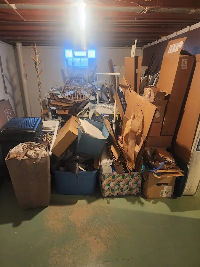 Roll-off dumpster container at job site for 2 Yard Dumpster Rental in Cascades